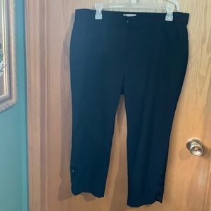 Dressy black capris with detailing at the bottom on both legs